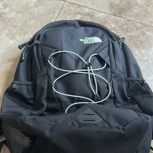 Northface jester backpack. Black with light teal